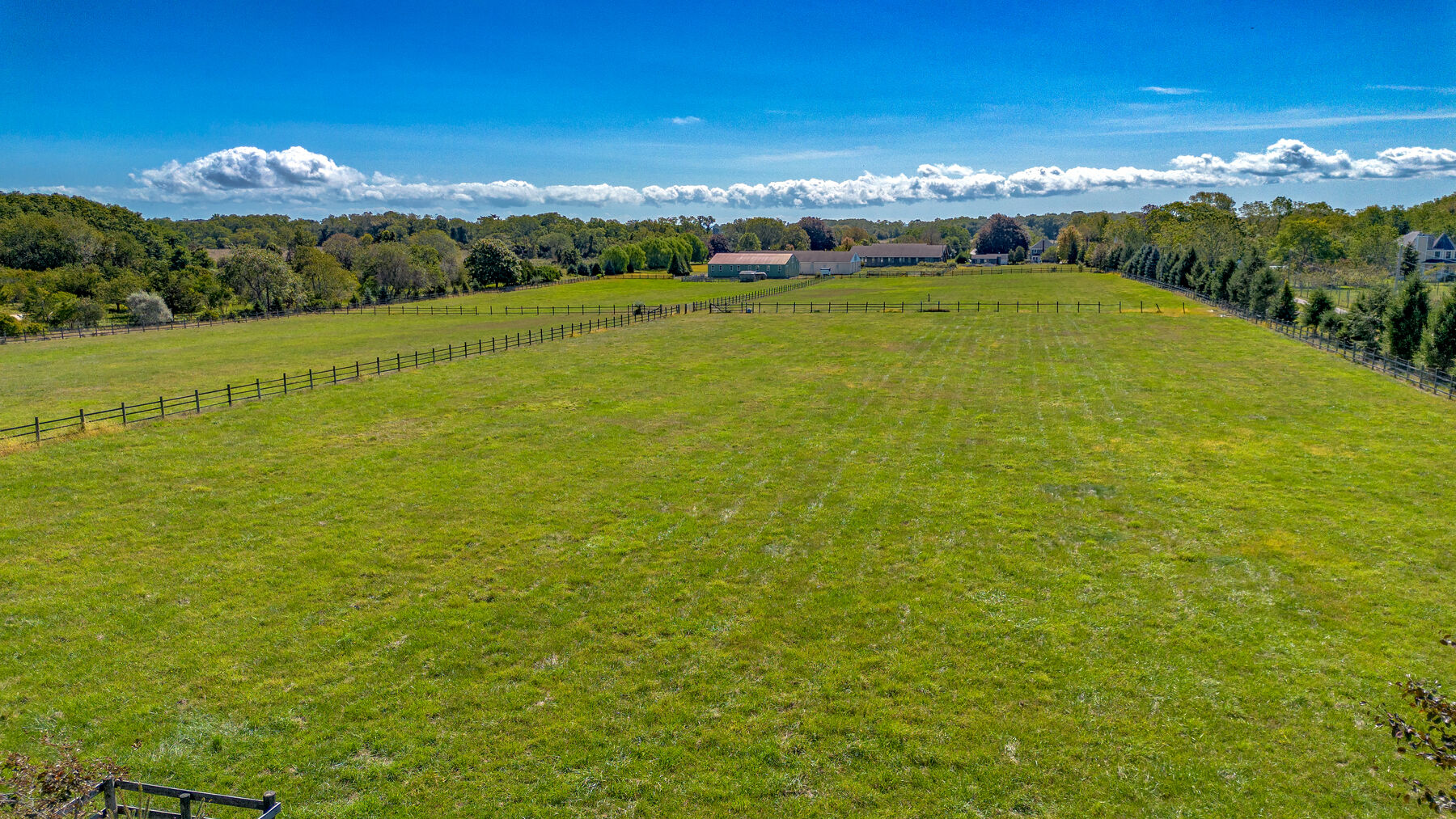 The fenced paddocks and pasture from above