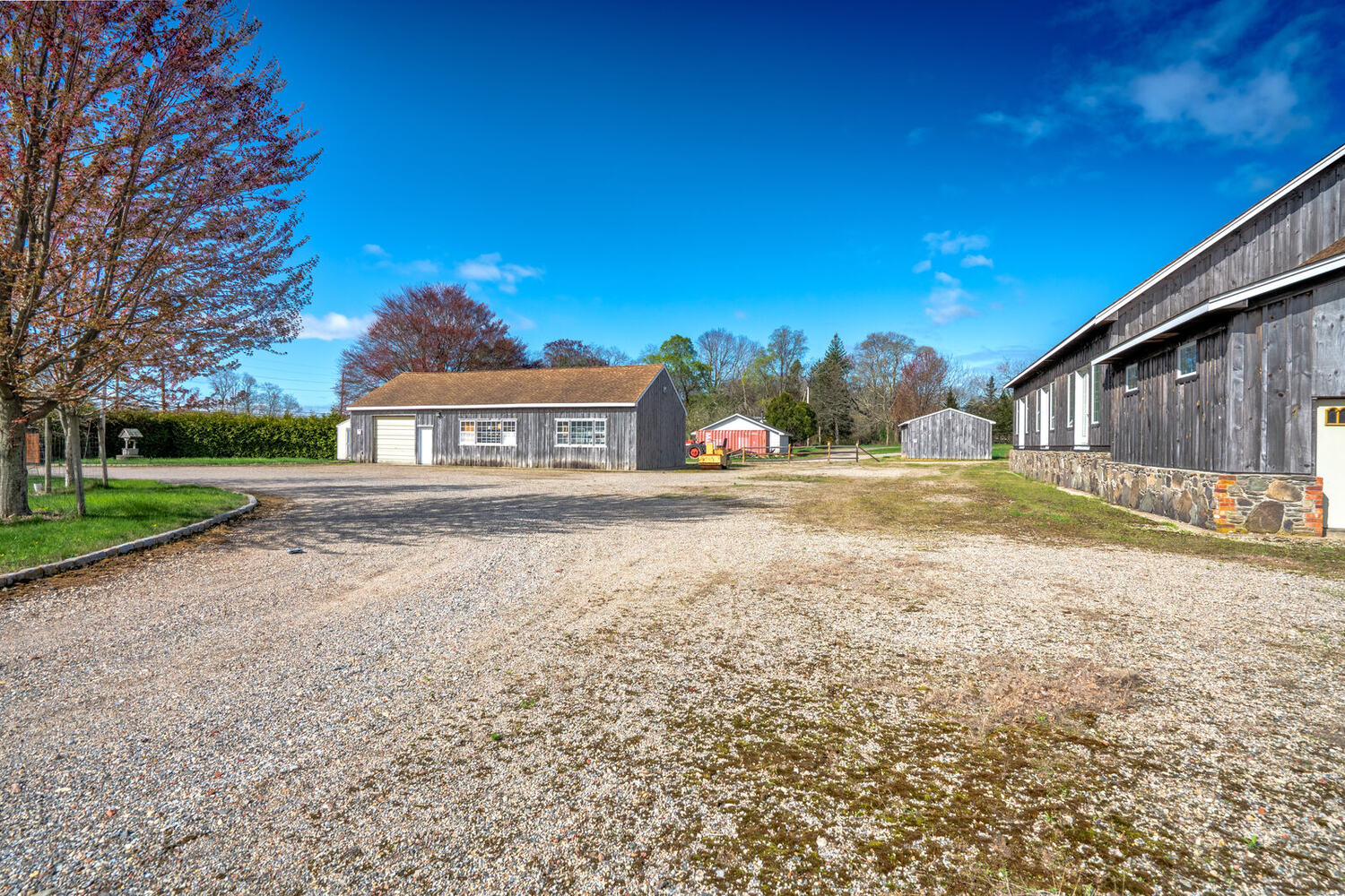 Building 1 seen across the gravel drive