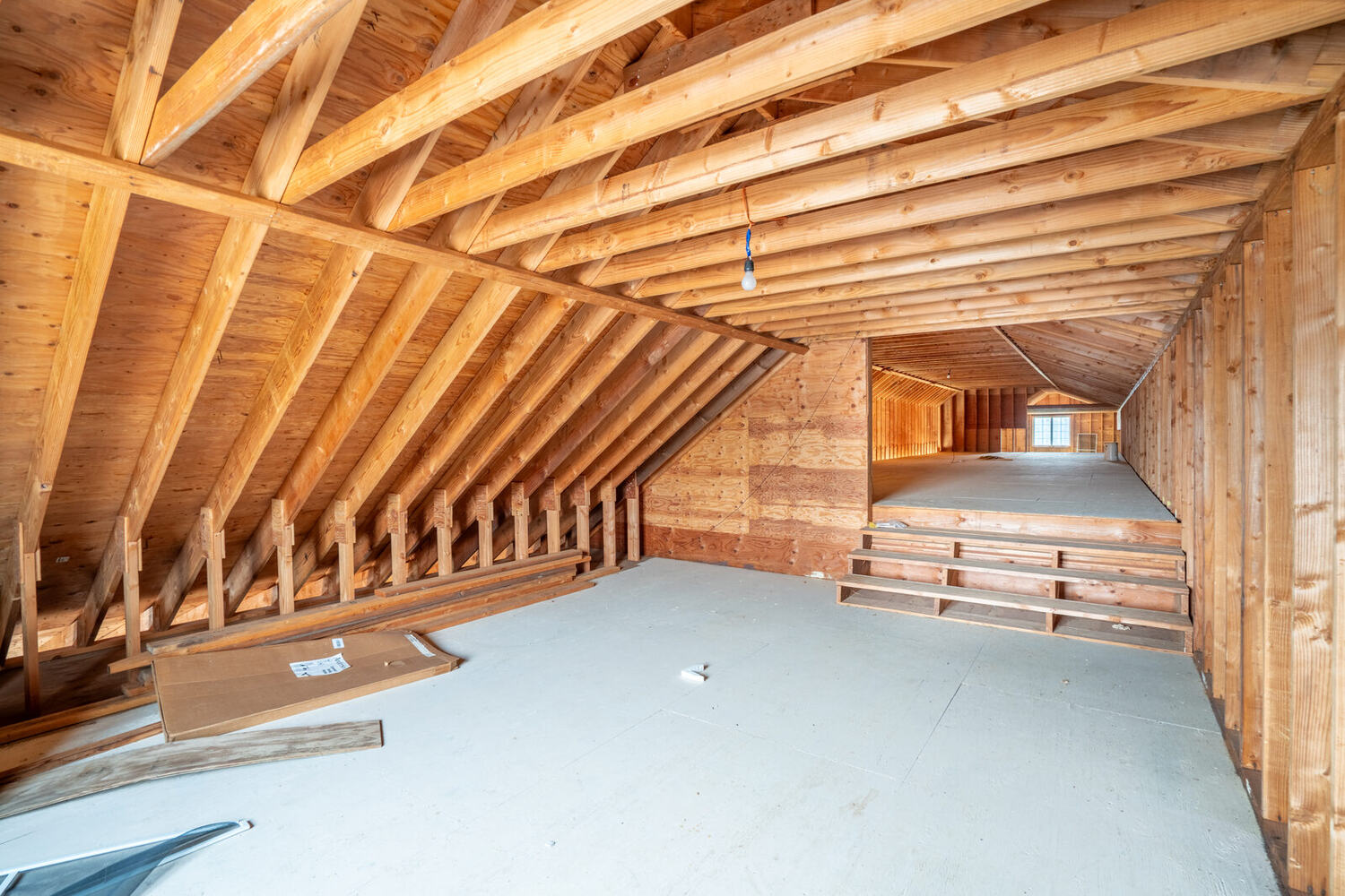 Framed interior of Building 2 looking toward the loft level