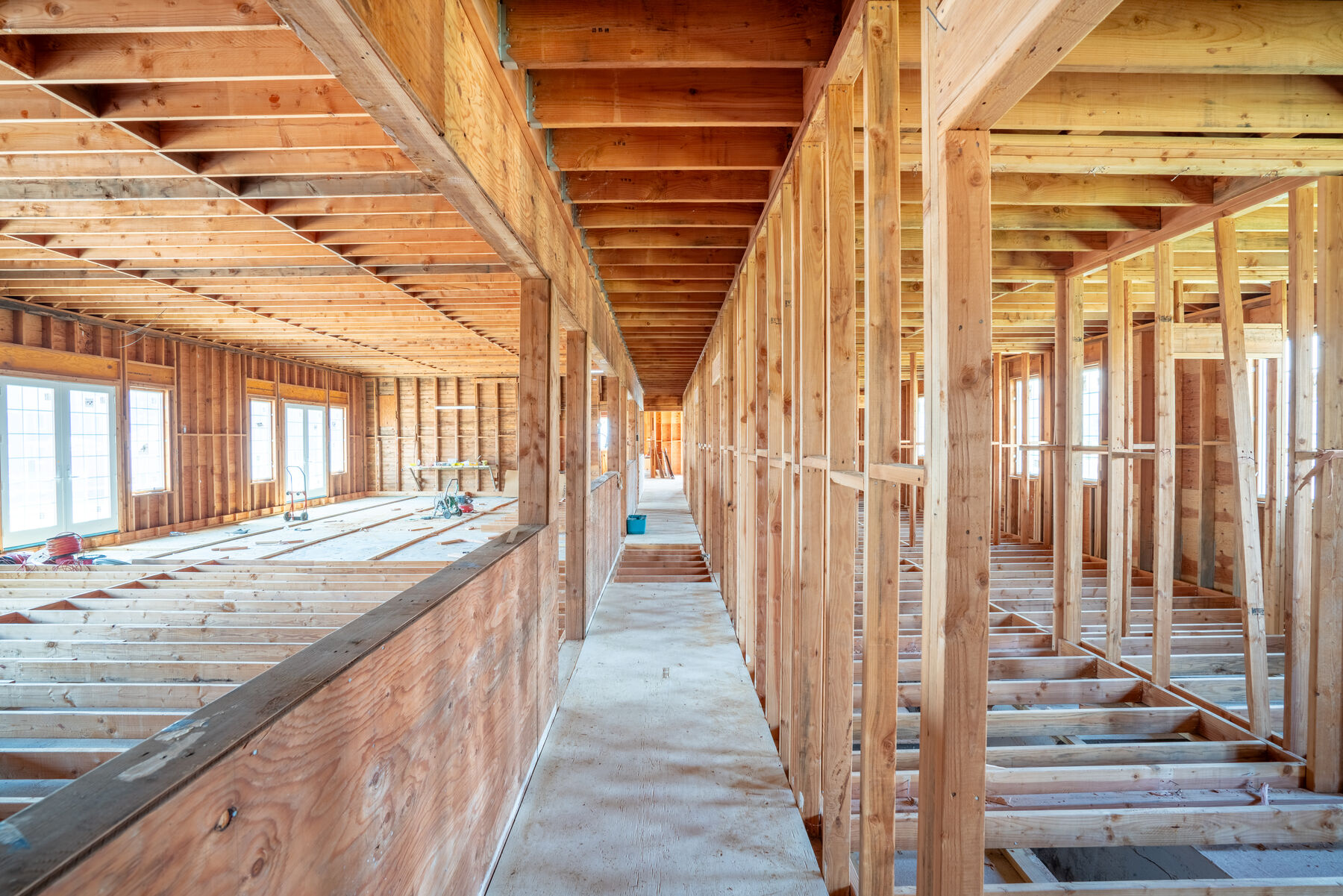 The 4,578 SF multi-use barn — framed interior ready for customization